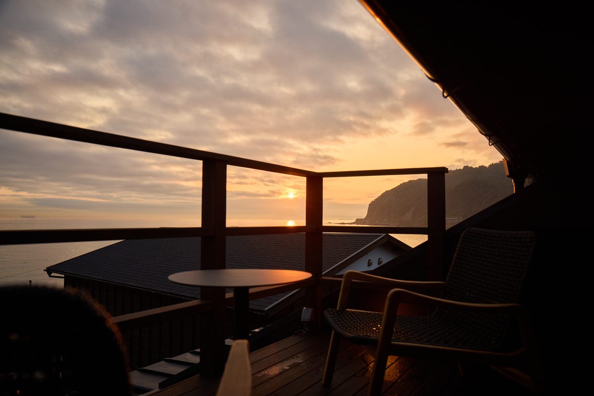A terrace seat facing the sunset