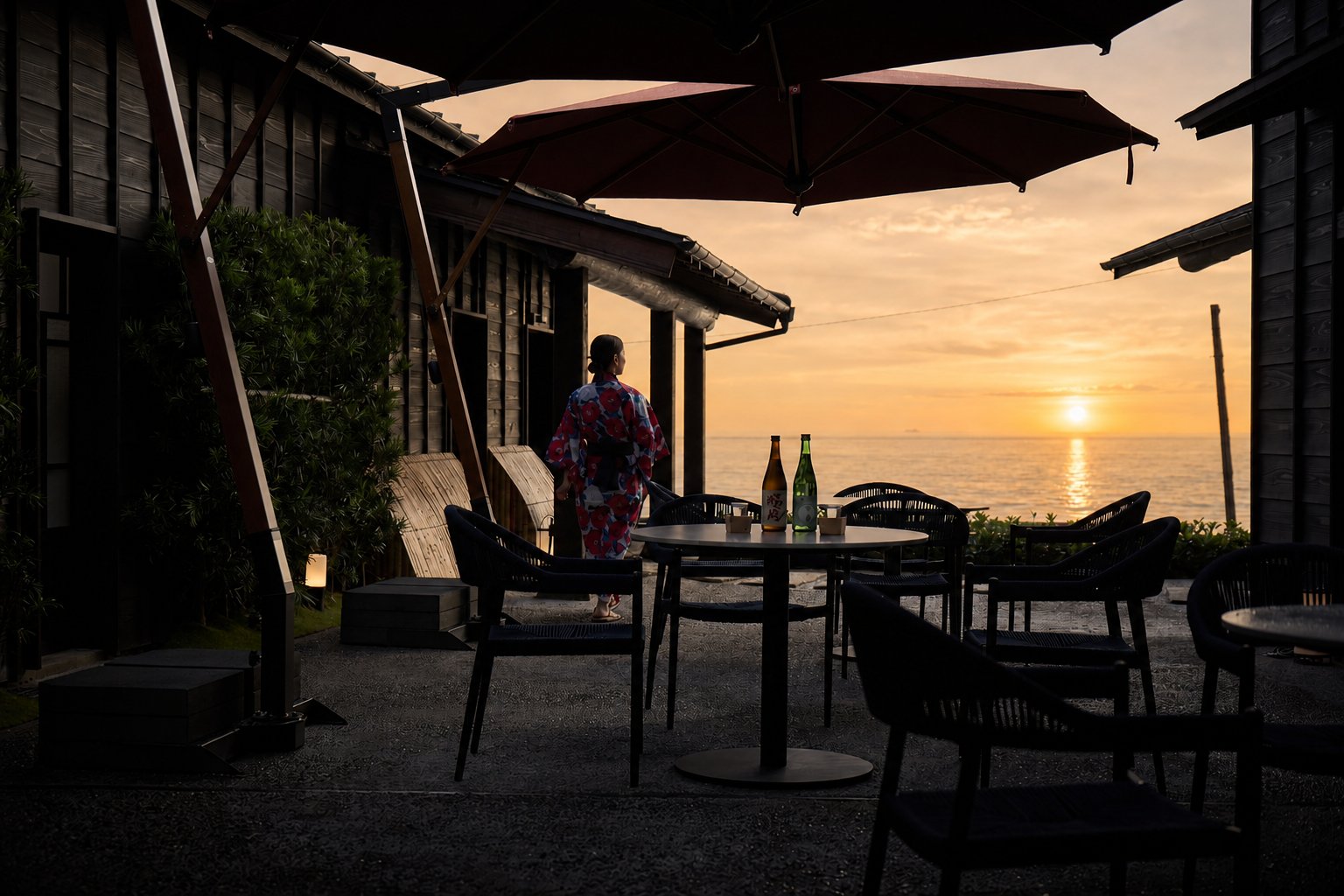 Enjoying local sake on the courtyard terrace at sunset